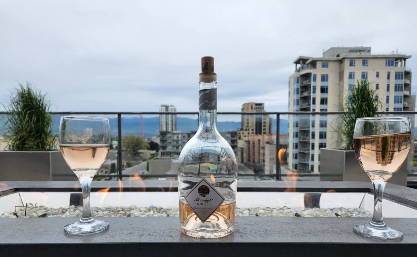 Enjoying some rosé at the Airbnb's rooftop fireplace!
